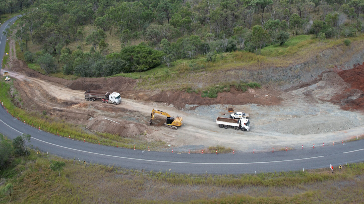 Trucks on roads signalling roadworks underway